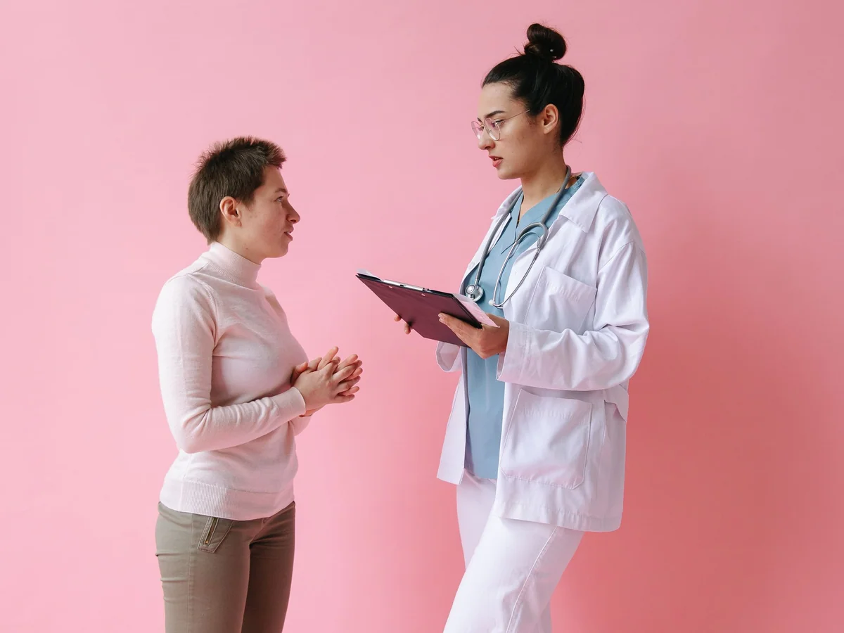 Woman coordinating family schedules and a care plan at home